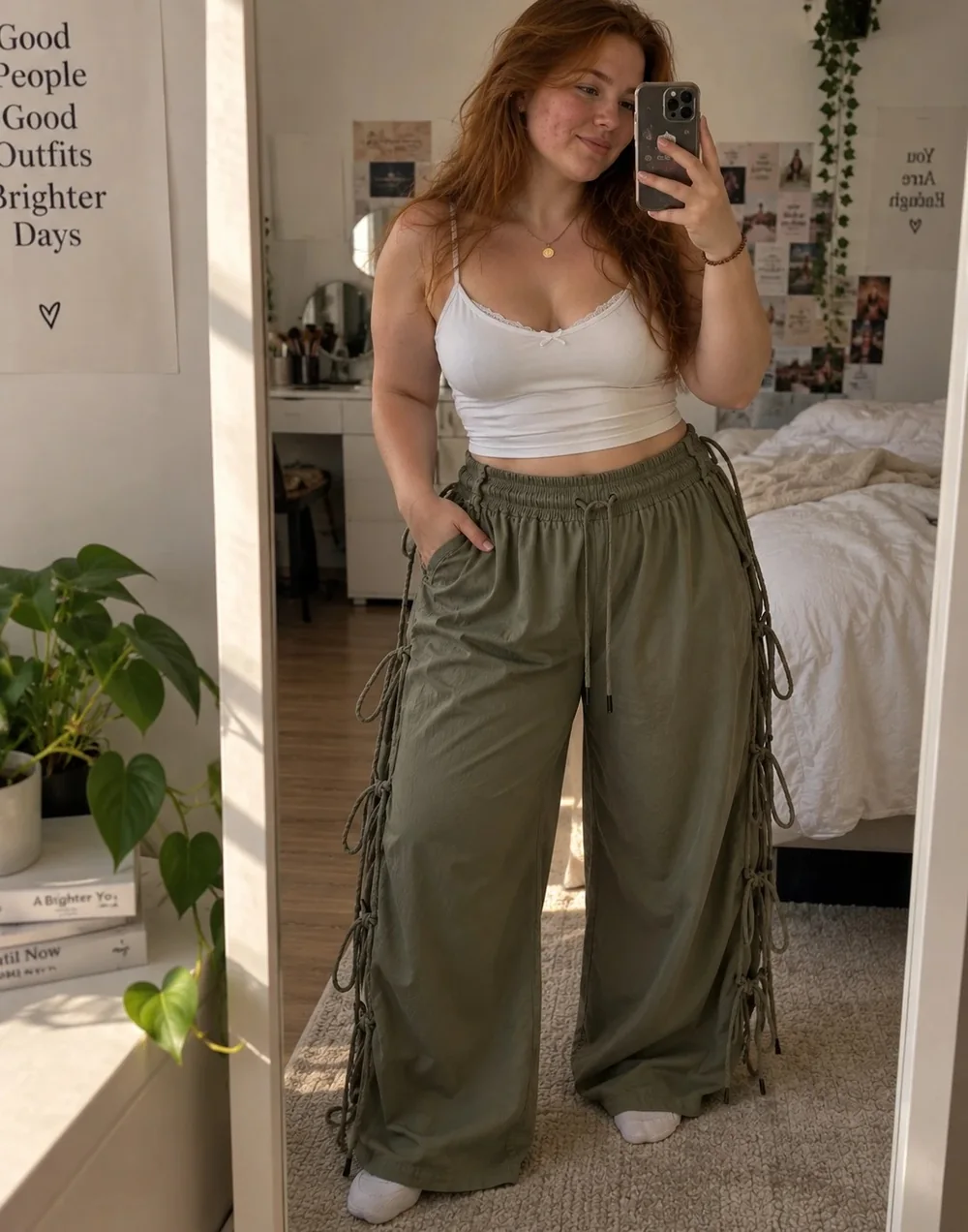 Outfit with olive pants and a white strappy top